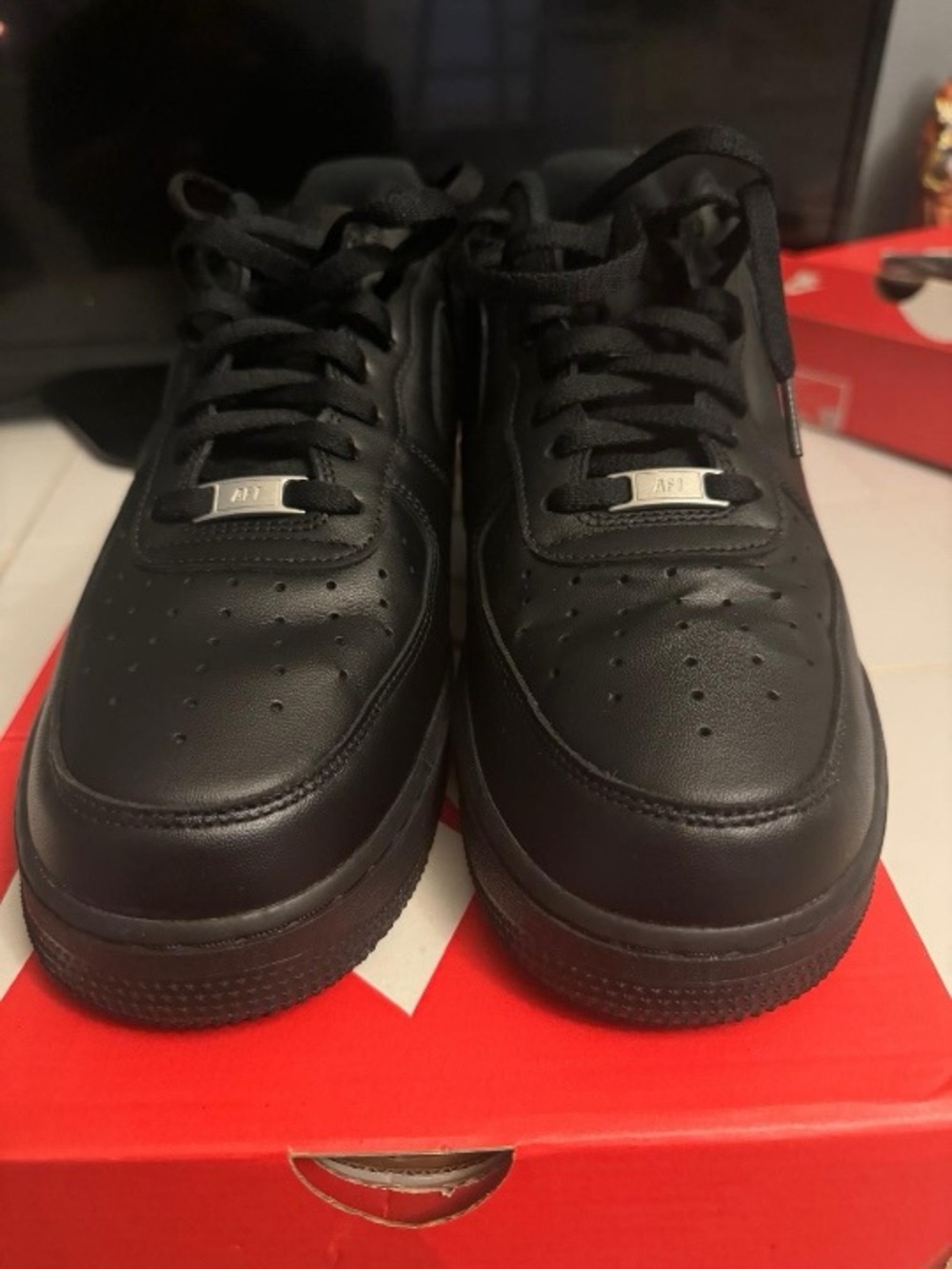 Nike Men’s Black Low-Top Leather Sneakers